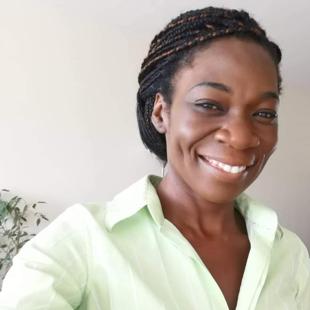 Lydia Agbobidi smiling at the camera